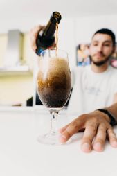 Barman with Coffee Island Beer