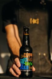 Barman with Coffee Island Beer